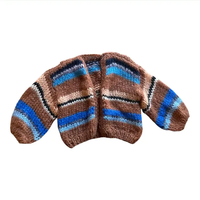 Existing product photo: knit cardigan on a flat surface